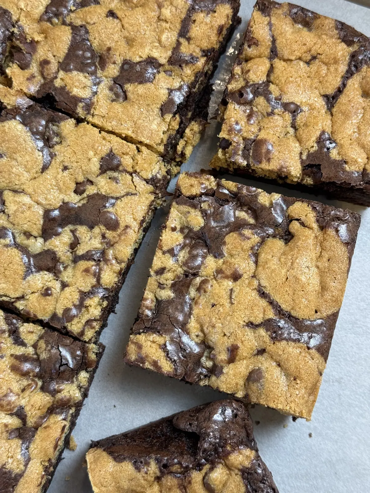 A tray of brookies cut into thick squares